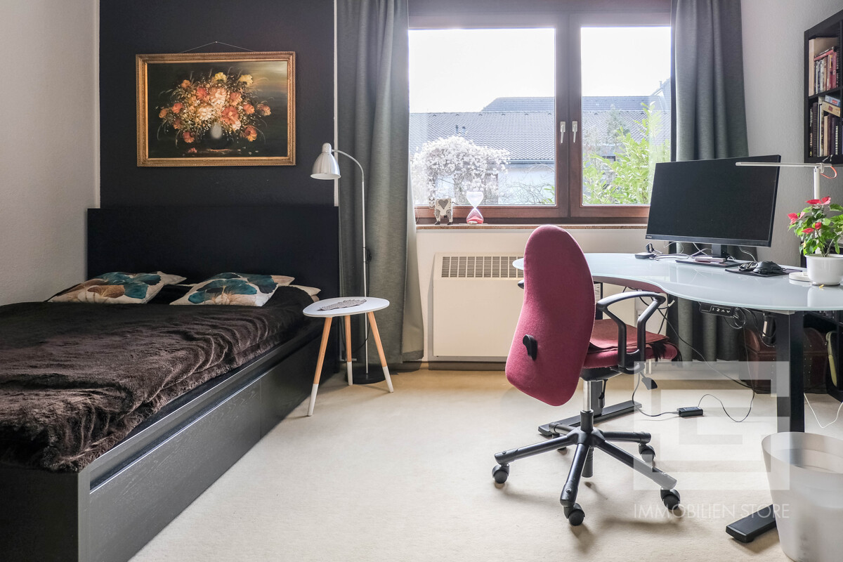 Das Arbeits-/ Kinderzimmer